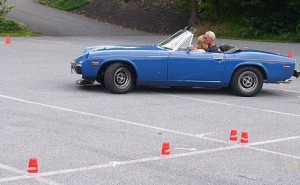 Large plastic drink cups weighted down with water are a good substitute for traffic cones