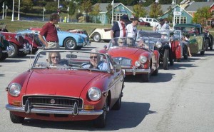 MGB, MGA and T-series cars lined up waiting to move.